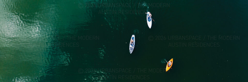 Kayakers on Lady Bird Lake in downtown Austin Texas