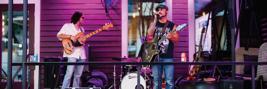 A band playing live music on Rainey Street in downtown Austin Texas