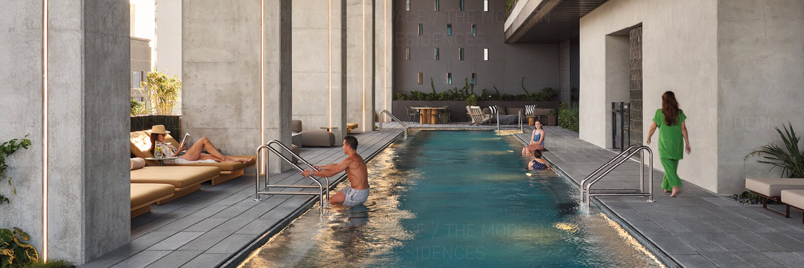 Swimmers and sunbathers at the pool at The Modern Austin Residences