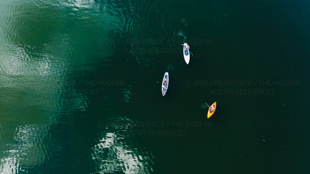 Kayakers on Lady Bird Lake in downtown Austin Texas