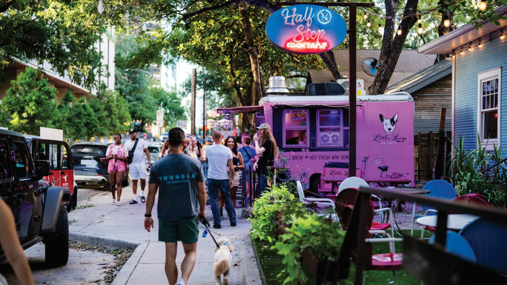 People on Rainey Street outside Half Step near The Modern Austin Residences