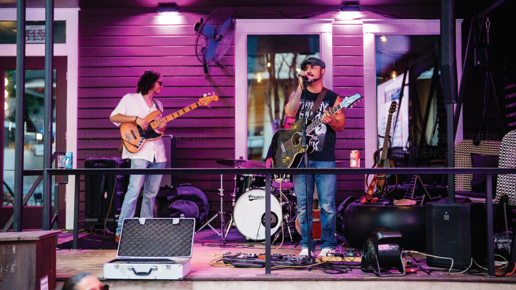 A band playing live music on Rainey Street in downtown Austin Texas