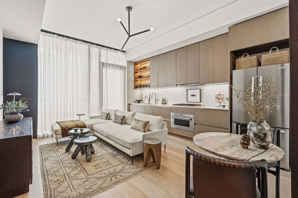 Modern condo living room with sofa and small dining table
