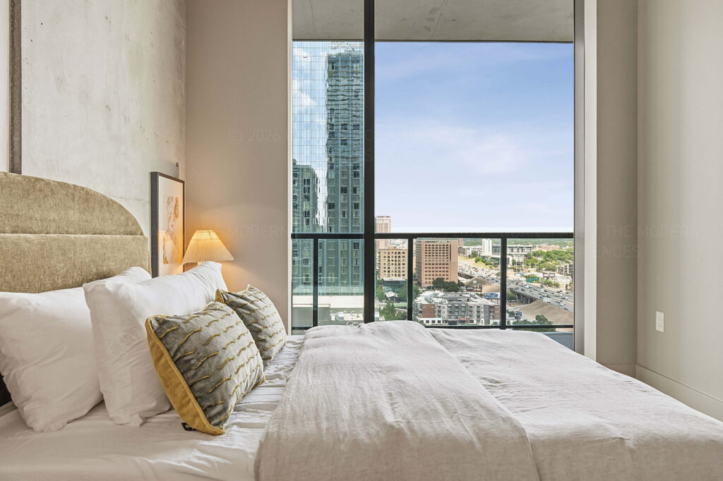 Modern condo bedroom with view
