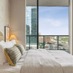 Modern condo bedroom with view