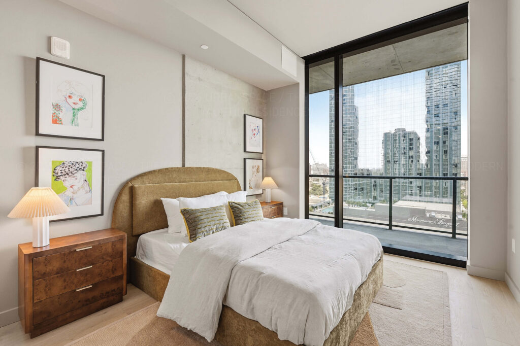 Modern condo bedroom with balcony view