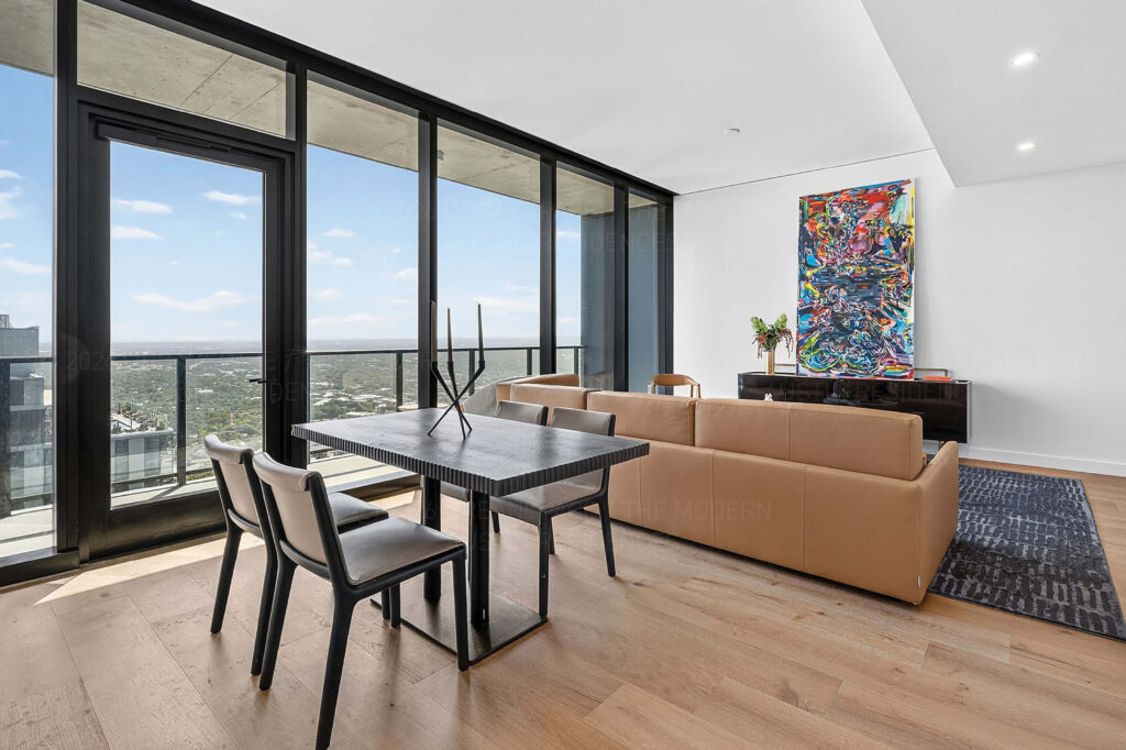 Living room in high rise modern condo at The Modern Austin Residences