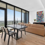 Living room in high rise modern condo at The Modern Austin Residences