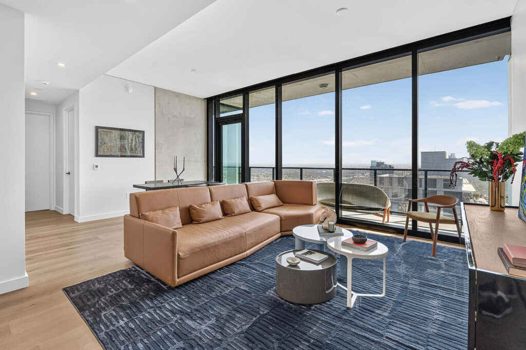 Living room in high rise modern condo at The Modern Austin Residences
