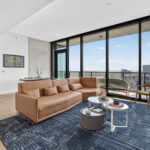 Living room in high rise modern condo at The Modern Austin Residences